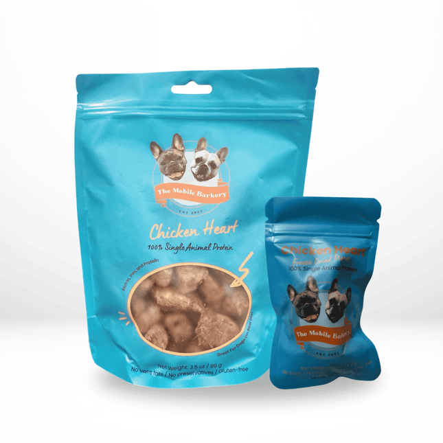 Two blue packages of Freeze dried chicken heart dog treats in resealable bags – single-ingredient, high-protein treat by The Mobile Barkery