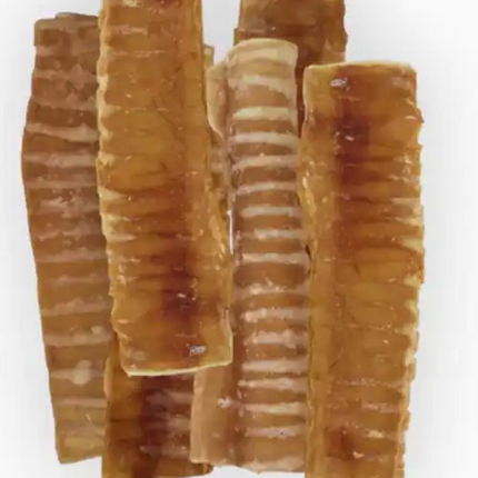 Pile of dried beef trachea treats for dogs, cut into short crunchy sections
