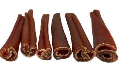 Six natural bully sticks for dogs in assorted thicknesses, arranged side by side with visible curled ends