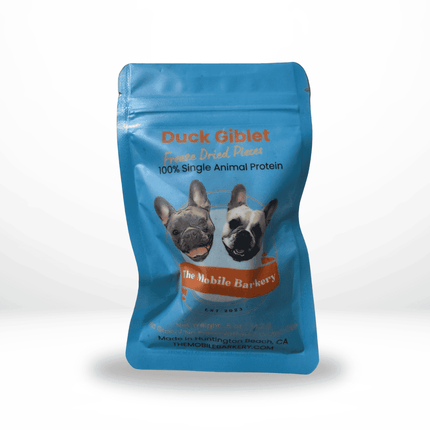 Blue pouch of duck giblet freeze-dried dog treats labeled 100% single animal protein from The Mobile Barkery