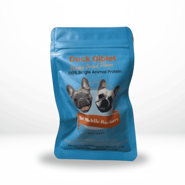 Blue pouch of duck giblet freeze-dried dog treats labeled 100% single animal protein from The Mobile Barkery