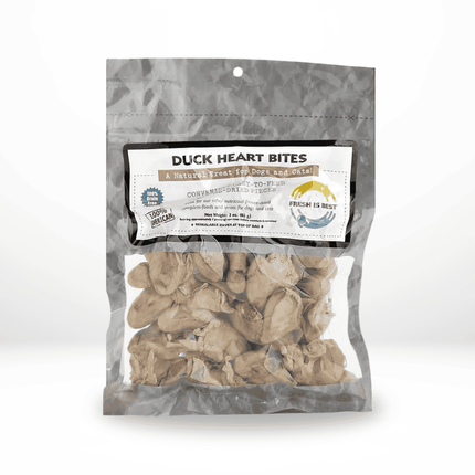 Transparent silver bag of freeze-dried duck hearts labeled for both dogs and cats with nutritional details.