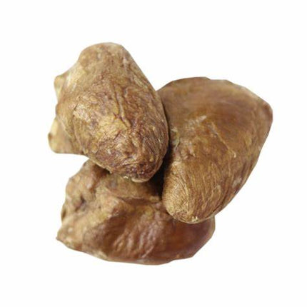 Three whole freeze-dried duck hearts stacked on a white background.