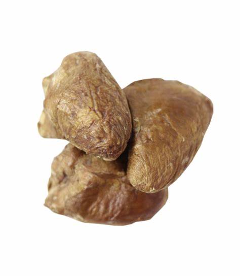 Three whole freeze-dried duck hearts stacked on a white background.